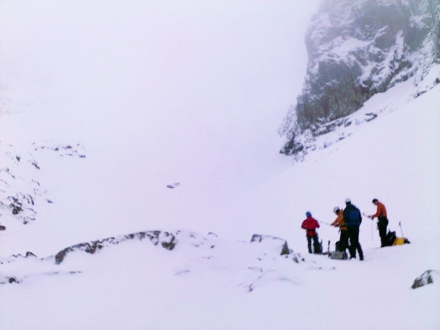 Checking the snowpack below No 5 Gully, Ben Nevis