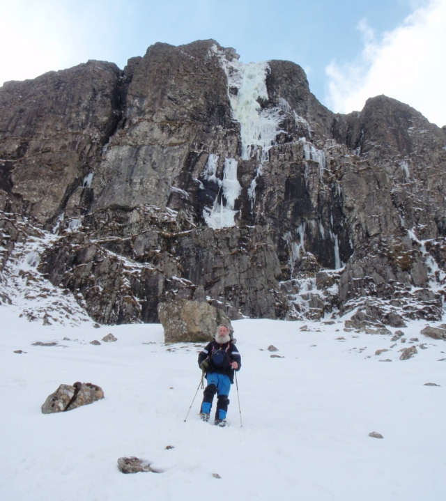Impressive ice falls above John on the descent from Twll Du (TS)