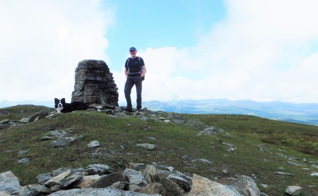 Border Collie ‘Mist’ at the summit Trig Point with the author (Thanks to the Slik Pro-Mini tripod)